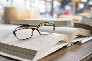 reading glasses on a book