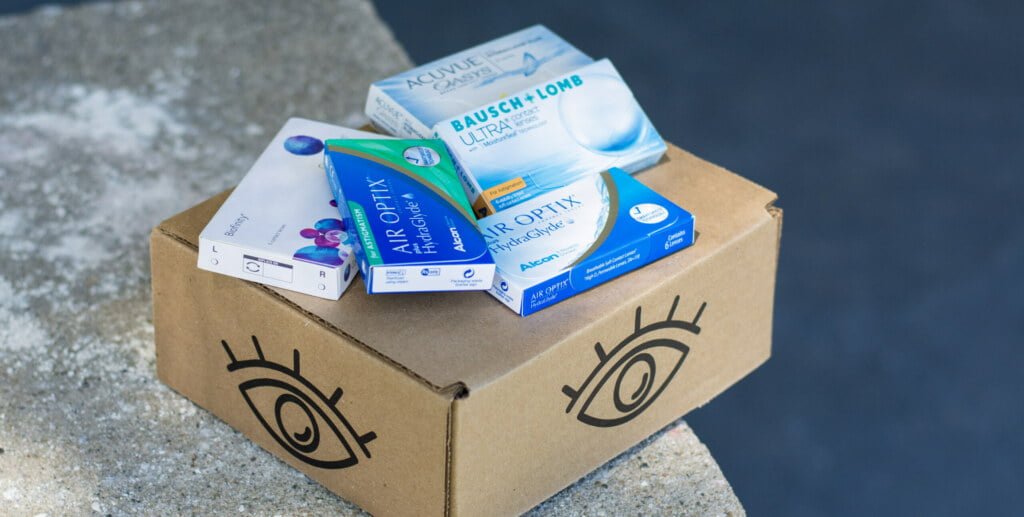 various contact lens brands on top of a shipping box